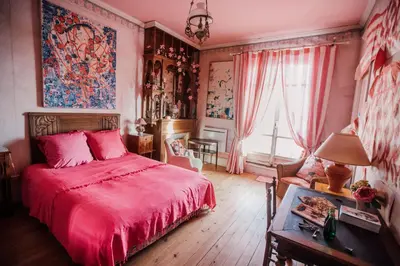 Un ou plusieurs lits dans un hébergement de l'établissement La Villa Louis, maison d'hôtes, vue mer