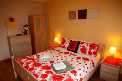 Un ou plusieurs lits dans un hébergement de l'établissement Les Gîtes Champêtres Walnut cottage