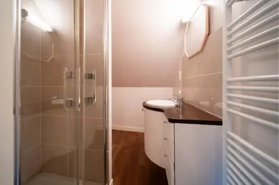 Salle de bains dans l'établissement Les calèches de l'Hôtel de Beaumont