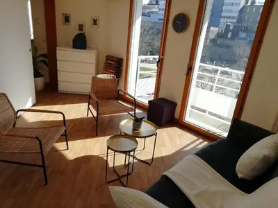 Coin salon dans l'établissement appart de charme -proche du jardin Dior