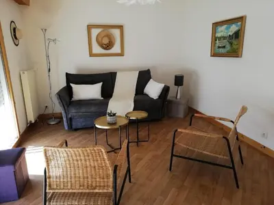 Coin salon dans l'établissement appart de charme -proche du jardin Dior