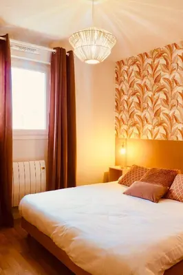 Un ou plusieurs lits dans un hébergement de l'établissement Charming apartment - private parking, balcony