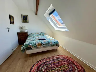Un ou plusieurs lits dans un hébergement de l'établissement Brèche Marais - Duplex niché en bord de mer