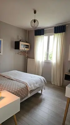 Un ou plusieurs lits dans un hébergement de l'établissement Bienvenue chez Didier et Domi