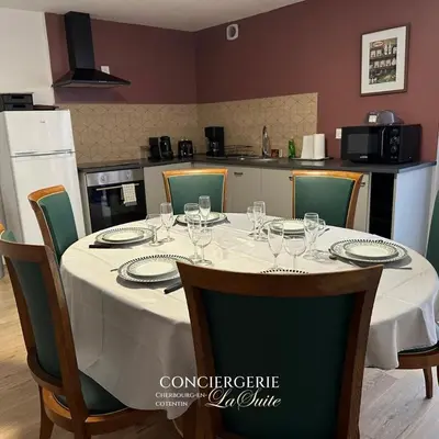 Cuisine ou kitchenette dans l'établissement Évasion à Hainneville