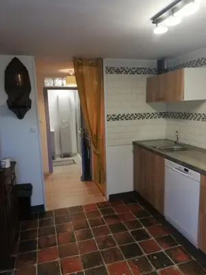 Cuisine ou kitchenette dans l'établissement maison des trois rivières