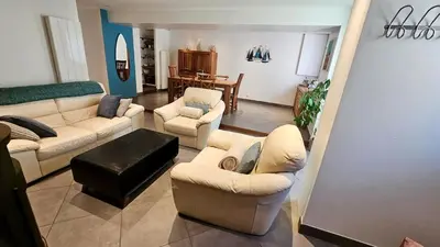 Coin salon dans l'établissement Maison de bourg proche de la mer