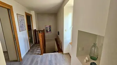 Un ou plusieurs lits dans un hébergement de l'établissement Maison de bourg proche de la mer