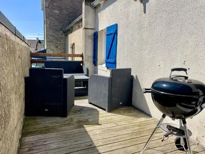 Barbecue disponible mis à disposition des clients de la maison de vacances