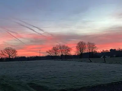 Lever ou coucher de soleil vu de la maison de vacances ou à proximité