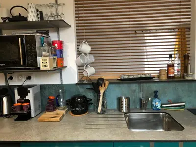 Cuisine ou kitchenette dans l'établissement Sauge et Romarin