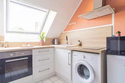 Cuisine ou kitchenette dans l'établissement Escale du mont