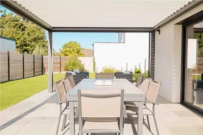 Terrasse ou espace extérieur de l'établissement Maison récente, plages et commerces à pied