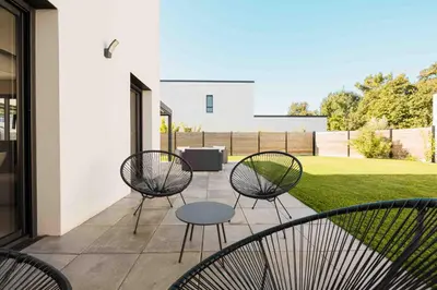 Coin salon dans l'établissement Maison récente, plages et commerces à pied