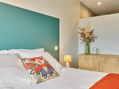 Un ou plusieurs lits dans un hébergement de l'établissement Holiday Home L'Aventure Gouvillaise by Interhome