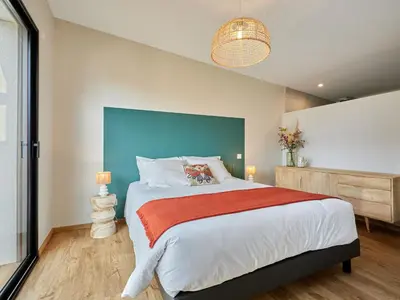 Un ou plusieurs lits dans un hébergement de l'établissement Holiday Home L'Aventure Gouvillaise by Interhome