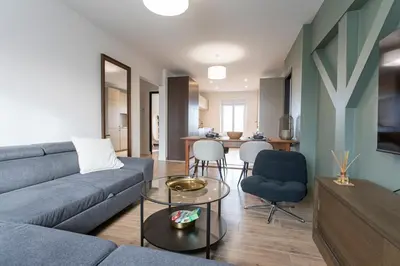 Coin salon dans l'établissement Appartement historique Dior