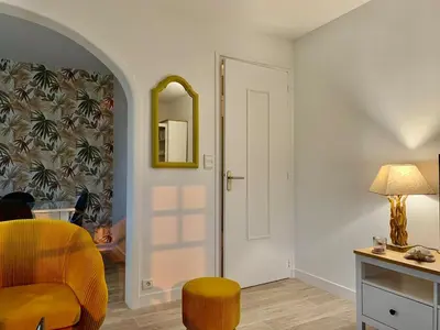 Coin salon dans l'établissement Appartement à Cancale situé à 500 m du port