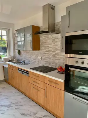Cuisine ou kitchenette dans l'établissement Appartement à Cancale situé à 500 m du port