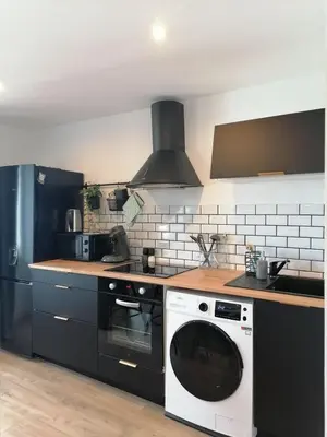 Cuisine ou kitchenette dans l'établissement Marine 3
