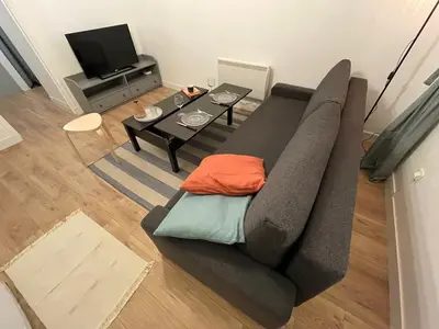 Télévision ou salle de divertissement dans l'établissement Marine 1