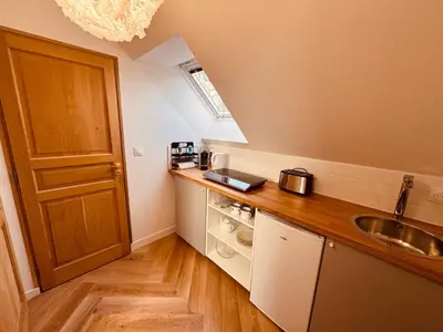 Cuisine ou kitchenette dans l'établissement Au petit Cachou