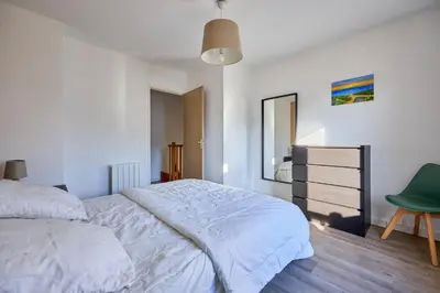 Un ou plusieurs lits dans un hébergement de l'établissement L'Ancre Bleue - Duplex à 10min de la plage