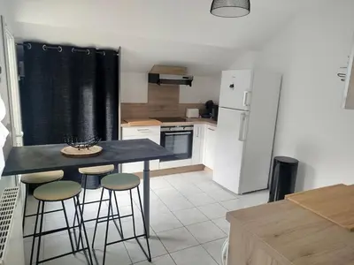 Cuisine ou kitchenette dans l'établissement Au refuge de la baie