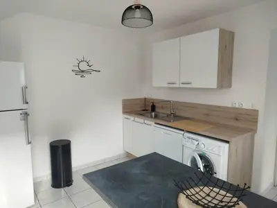 Cuisine ou kitchenette dans l'établissement Au refuge de la baie