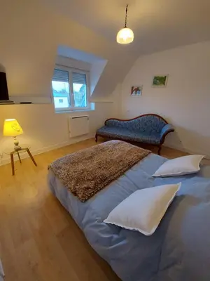 Un ou plusieurs lits dans un hébergement de l'établissement Chambre Alice