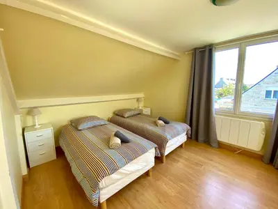 Un ou plusieurs lits dans un hébergement de l'établissement Villa Saint Antoine, vue mer à 60m de la plage