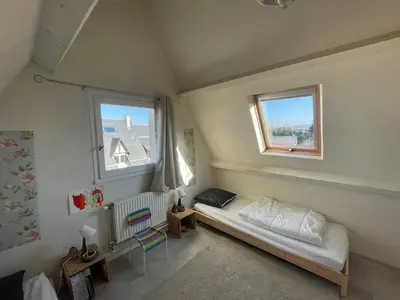 Un ou plusieurs lits dans un hébergement de l'établissement Cottage with Garden 5mn Beach
