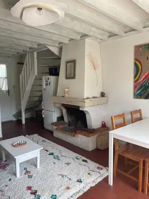 Coin salon dans l'établissement Cottage with Garden 5mn Beach