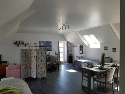 Coin salon dans l'établissement Le gîte d'Isa