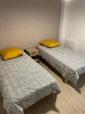 Un ou plusieurs lits dans un hébergement de l'établissement Maison avec vue mer à Omaha Beach - idéal familles