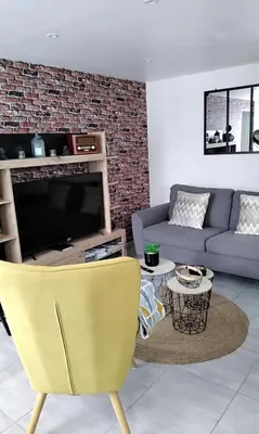 Télévision ou salle de divertissement dans l'établissement La petite ruette