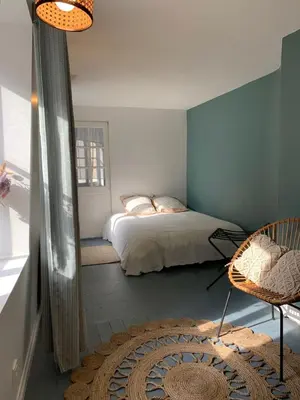 Un ou plusieurs lits dans un hébergement de l'établissement Appartement Coeur historique de Bayeux