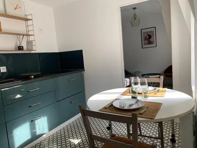 Cuisine ou kitchenette dans l'établissement Appartement Coeur historique de Bayeux