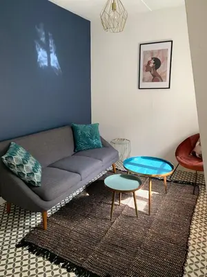 Coin salon dans l'établissement Appartement Coeur historique de Bayeux