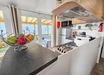 Cuisine ou kitchenette dans l'établissement Nature & Sérénité