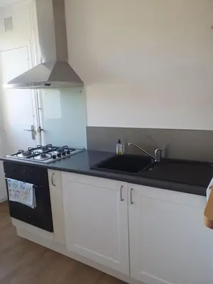 Cuisine ou kitchenette dans l'établissement Le nouveau monde