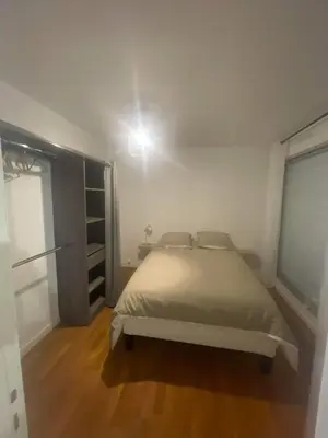 Un ou plusieurs lits dans un hébergement de l'établissement Appartement face au port