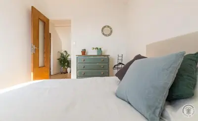 Un ou plusieurs lits dans un hébergement de l'établissement Charmante maison du vieux Coutainville, à 15mn à pied de la mer, classée 3 étoiles