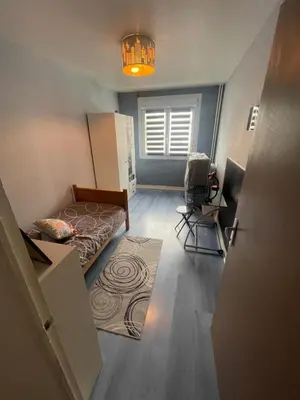 Coin salon dans l'établissement Appartement proche du centre - 58 m2