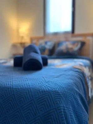 Un ou plusieurs lits dans un hébergement de l'établissement Le Petit Cabourg plage - vue mer