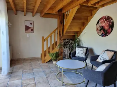 Coin salon dans l'établissement Au Mont De La Rive #Jaccuzi et Mont-Saint-Michel #