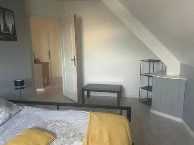 Un ou plusieurs lits dans un hébergement de l'établissement Gîte de la Mancellière sur vire