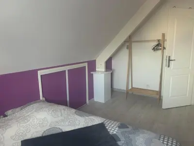 Un ou plusieurs lits dans un hébergement de l'établissement Gîte de la Mancellière sur vire