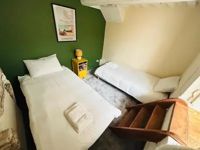 Un ou plusieurs lits dans un hébergement de l'établissement Superbe loft de charme - centre ancien