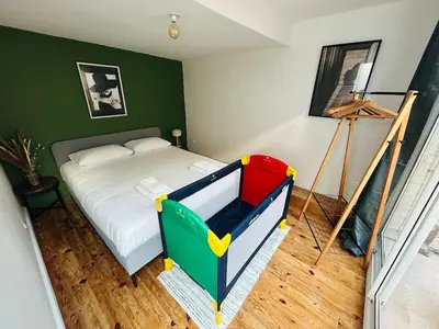 Un ou plusieurs lits dans un hébergement de l'établissement Superbe loft de charme - centre ancien